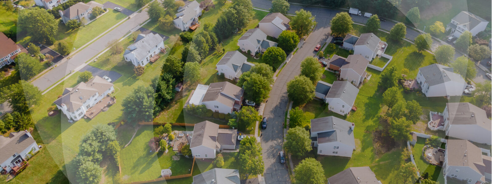 Drone view of a leafy suburban midwestern neighborhood