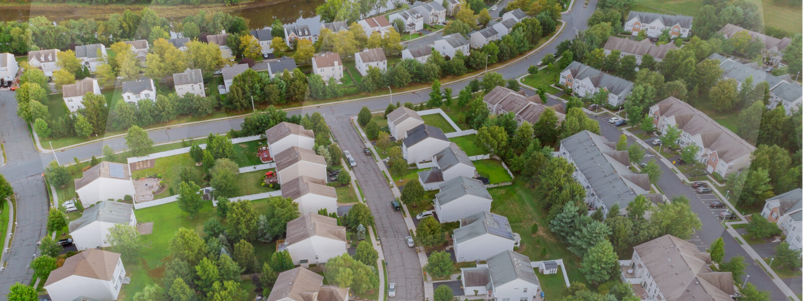 Drone view of a leafy suburban midwestern neighborhood